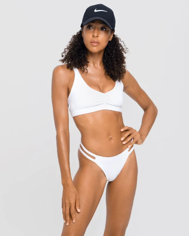 Sustainable bikini made from recycled materials for eco - conscious beachgoersKiku Sporty Bra Bikini Top