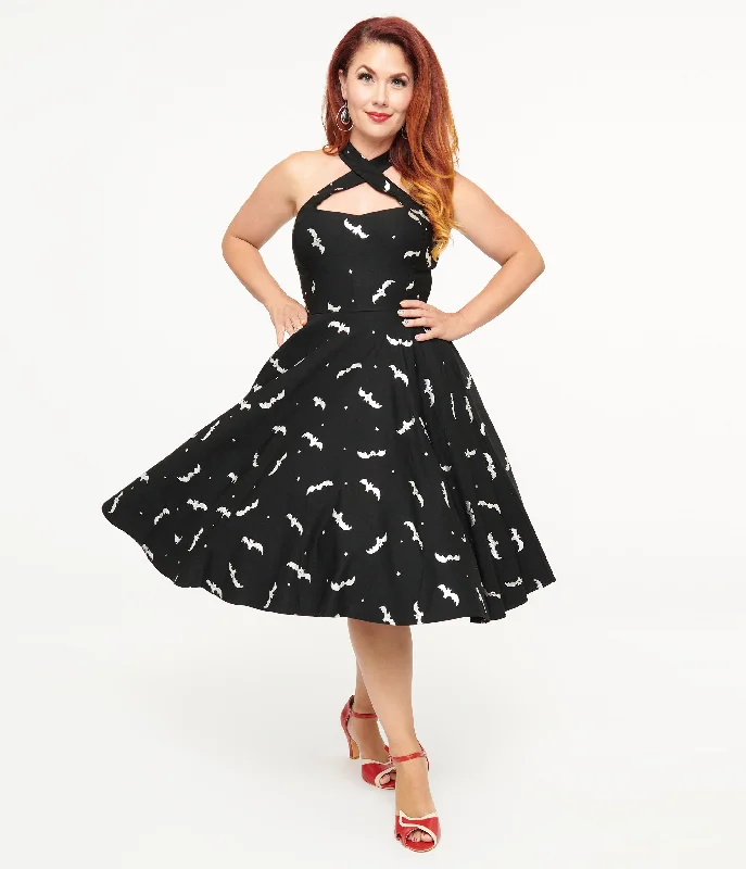 Mini Women Dress with a Short Hem for a Young and Trendy StyleUnique Vintage 1950s Black & Silver Bats Criss Cross Halter Rita Flare Dress